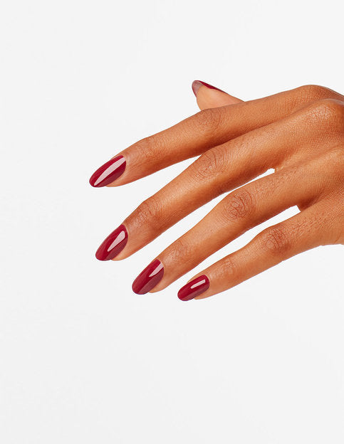 OPI Intelli GelColor Chick Flick Cherry gel nail polish on a manicured hand with shiny, vibrant red nails.