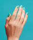 OPI Intelli GelColor gel nail polish in the shade I'm Yacht Leaving, showcasing a vibrant, glossy blue-green finish.