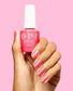 OPI Intelli GelColor nail polish in If U Like Pinka Coladas, pink shade applied on fingers with the bottle visible.