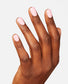 OPI Intelli GelColor It's A Girl gel nail polish on neatly manicured nails with a soft pink shade.