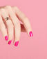 OPI Intelli GelColor La Paz-itively Hot gel nail polish bottle with vibrant orange shade and branding visible.