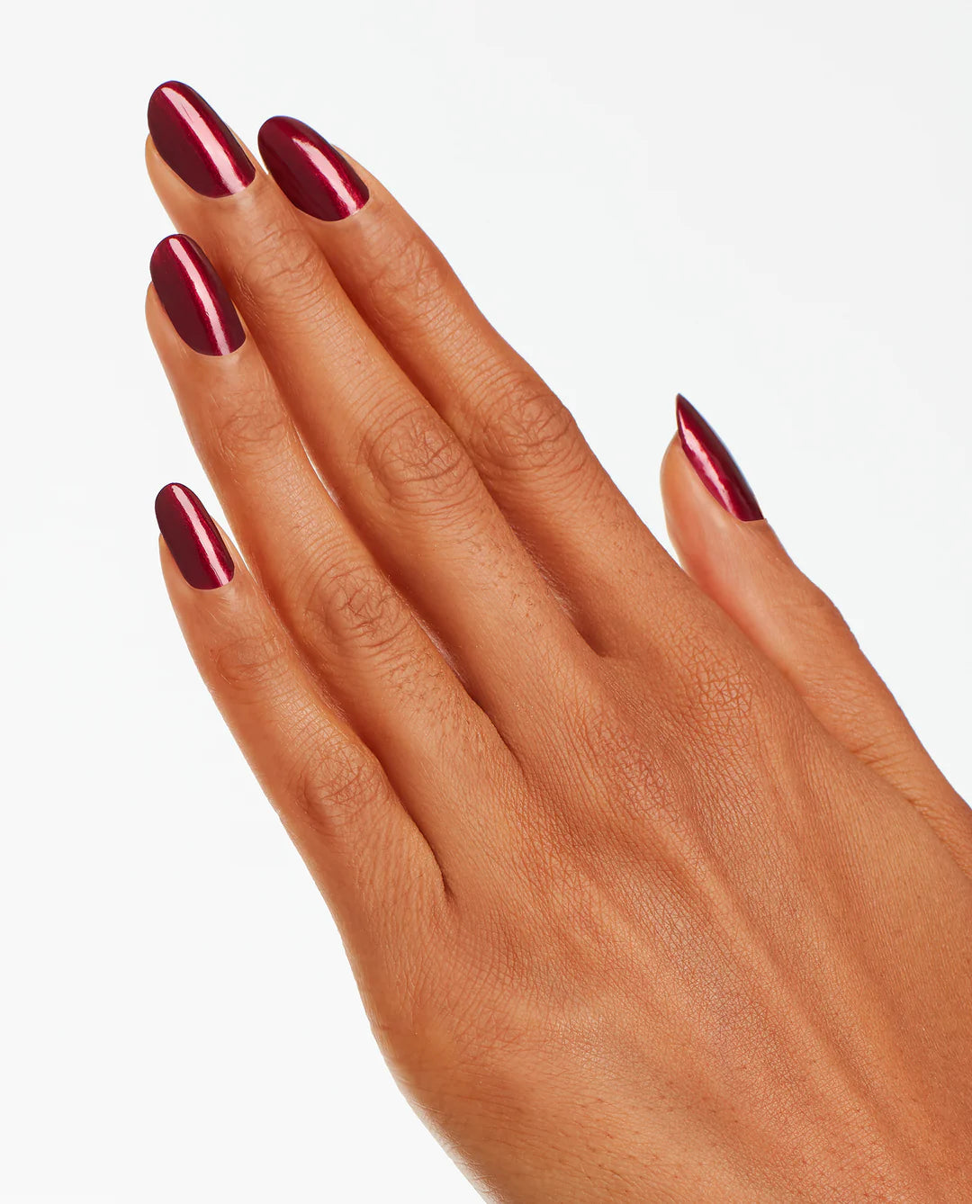 OPI ProHealth GelColor and matching lacquer in Bogotá Blackberry, showcasing a deep, glossy dark purple gel nail polish and lacquer finish