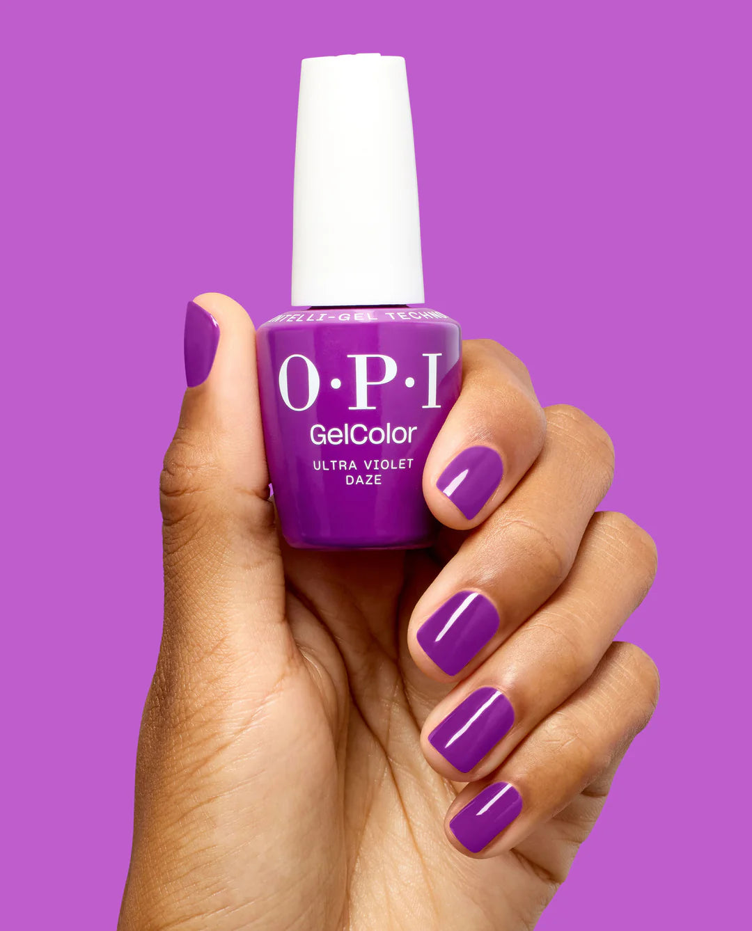 OPI ProHealth GelColor Ultra Violet Daze gel nail polish and matching lacquer on a hand, showcasing vibrant purple color.