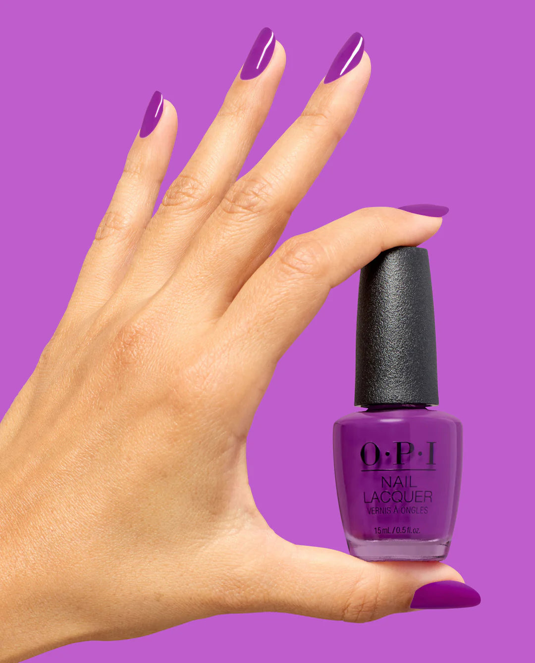OPI Pro Health GelColor Ultra Violet Daze gel nail polish and matching lacquer on hand with bottle, vibrant purple shade.