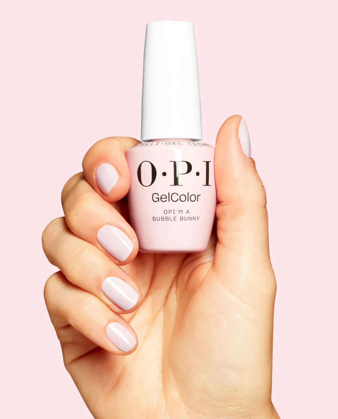 OPI Intelli GelColor OPI’m a Bubble Bunny gel nail polish bottle and hand with manicured nails showing the vibrant pink shade