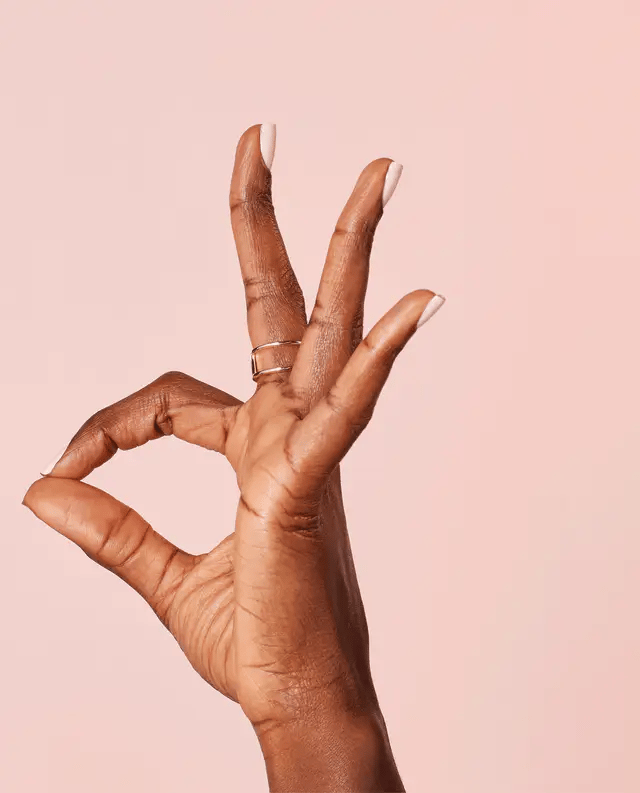 Opi Intelli GelColor Stop It I'm Blushing gel nail polish in soft pink shade, shown in a sleek bottle with a closed cap.