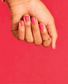 OPI Intelli GelColor Strawberry Margarita gel nail polish in a vibrant pink shade, displayed in a sleek bottle.