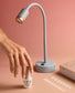 Opi Lightning Flash Cure Gel Lamp by Opi GELevate for curing gel nails, shown with sleek black design and multiple light settings.