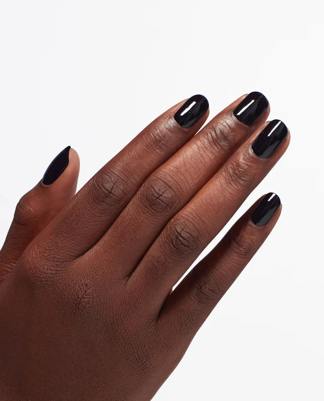 OPI Mirror Shine Top Coat bottle from OPI Nail Treatments, with a glossy, reflective finish visible on a manicured nail.