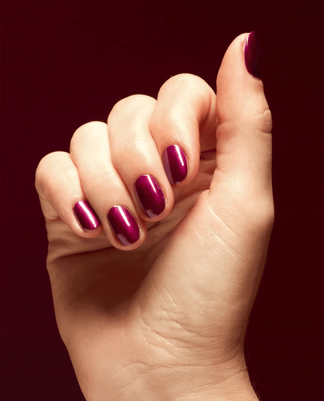 OPI Nail Polish in Big Sagittarius Energy shade, vibrant orange nail polish bottle with the product label visible.