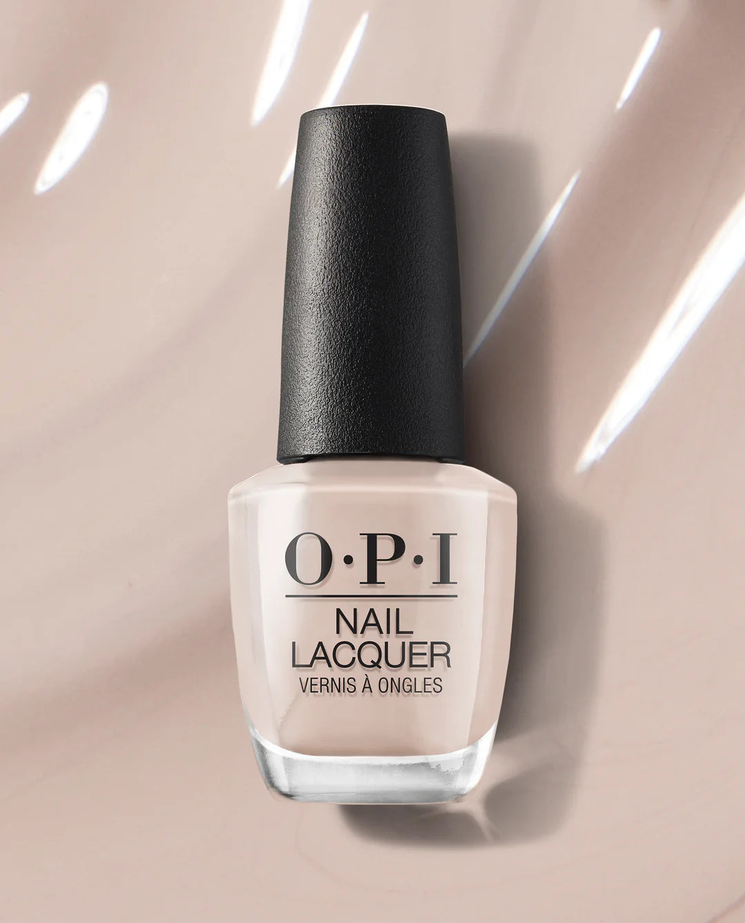 OPI Nail Polish in Coconuts Over OPI, a creamy beige nail lacquer with smooth, glossy finish, displayed in a bottle.