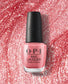 OPI Cozu-Melted In The Sun nail polish bottle featuring a warm, melted-orange shade with a glossy finish.
