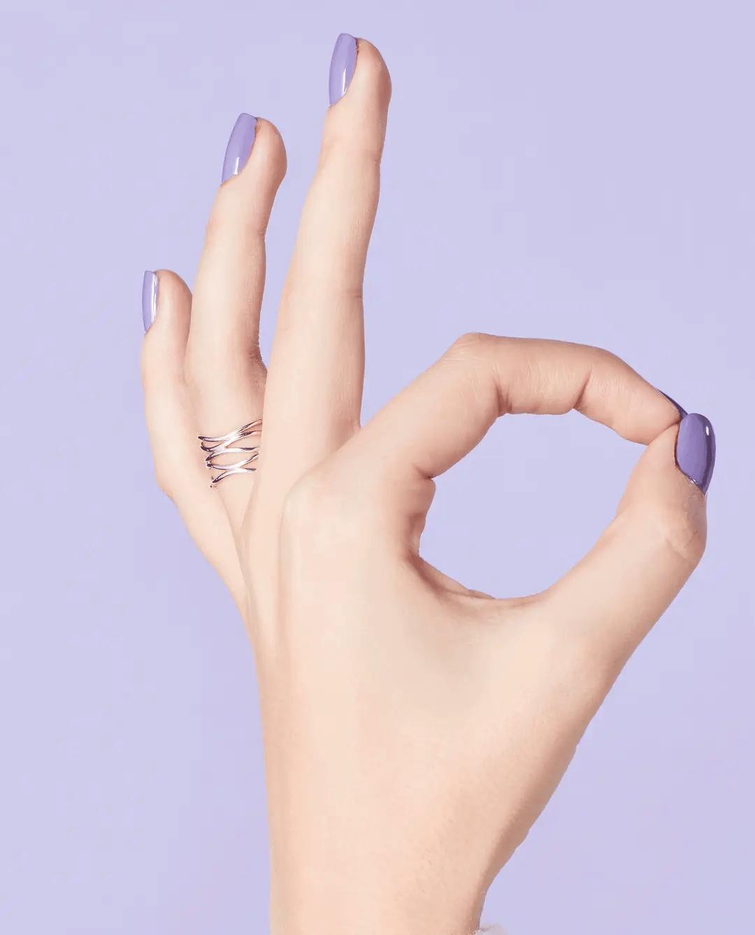 OPI Nail Polish in Do You Lilac It? NLB29 featuring a vibrant lilac purple shade in a sleek nail polish bottle