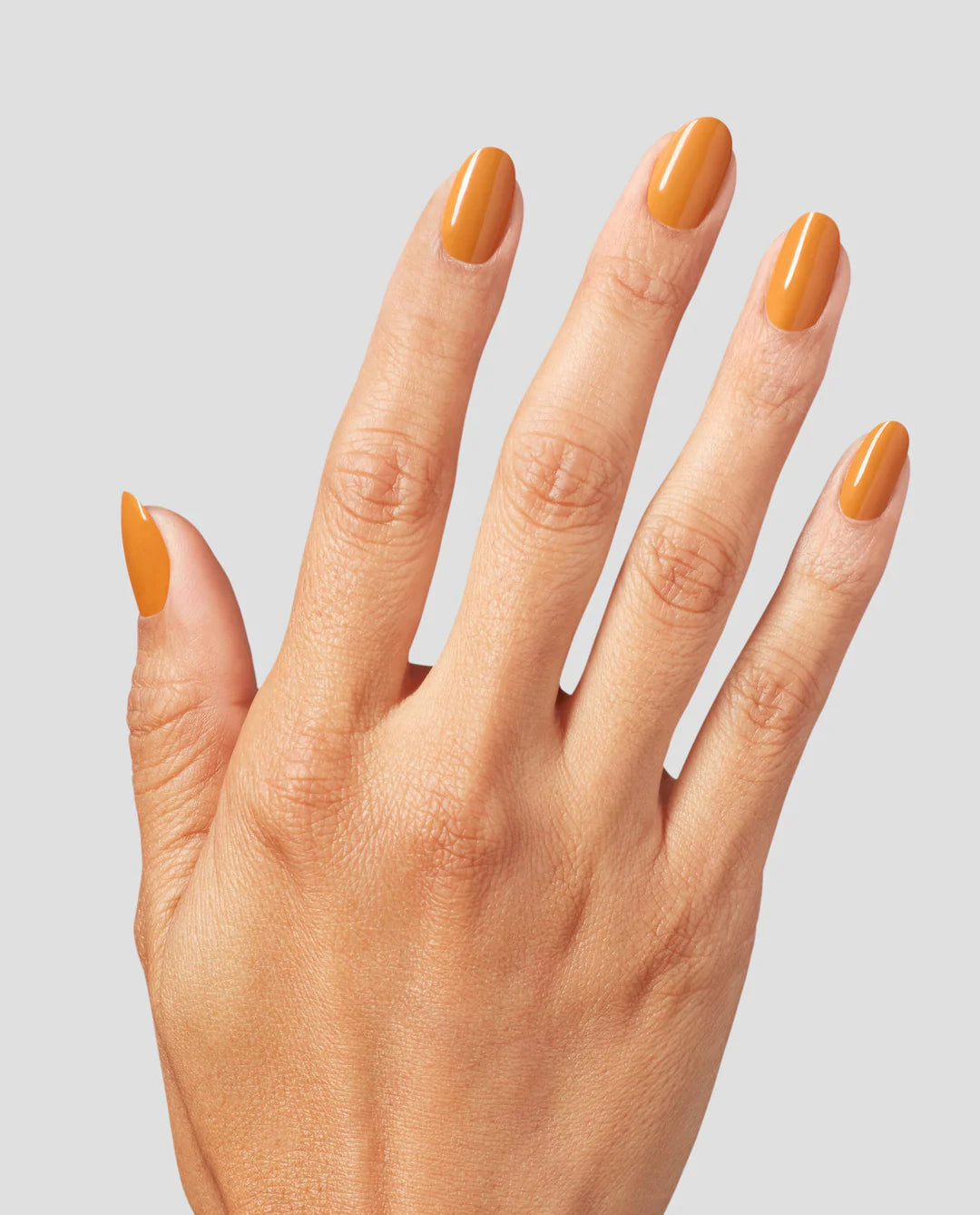 OPI Nail Polish in Penny Loafer Lane, a warm fall shade with a glossy finish, displayed in a clear bottle with the OPI logo.
