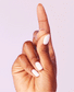 OPI Nail Polish in Hue Is The Artist? shade, showing a hand with painted nails in a vibrant, glossy color.