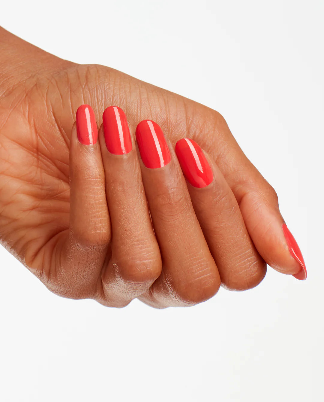 OPI Nail Polish in I Eat Mainely Lobster shade, vibrant coral-orange color, with a smooth, glossy finish on a nail.