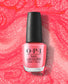 OPI Nail Polish in If U Like Pinka Coladas NLS083, vibrant pink nail lacquer in a sleek bottle, ready for manicures.
