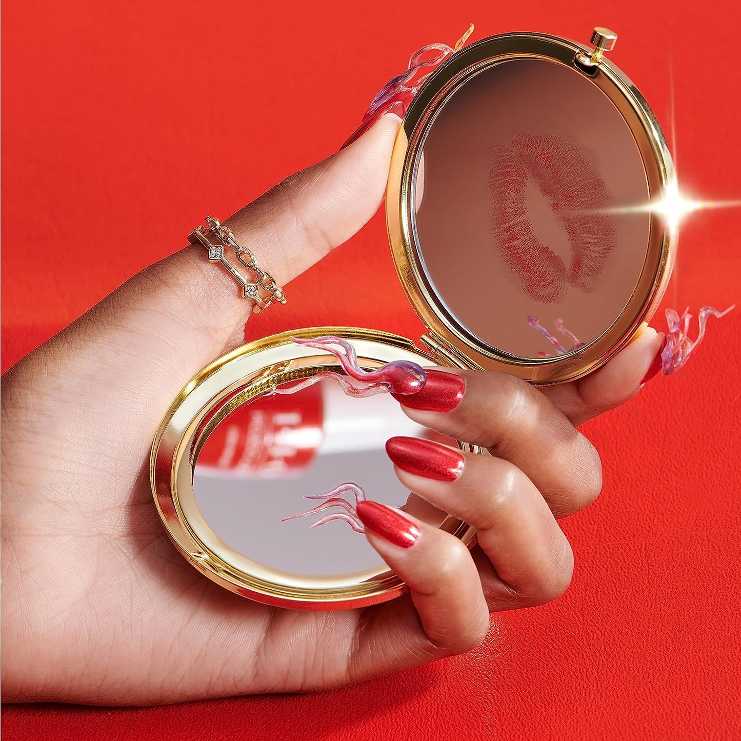 OPI Kiss My Aries #H025 nail polish bottle with bright coral-orange color in a clear glass bottle, showcasing the vibrant shade.