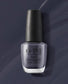 OPI Nail Polish Less is Norse #I59 bottle with dark gray lacquer, displaying the nail polish brand and product color.