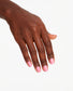 OPI Nail Polish in Lima Tell You About This Color, showcasing a smooth, vibrant lime-green nail polish on a hand.