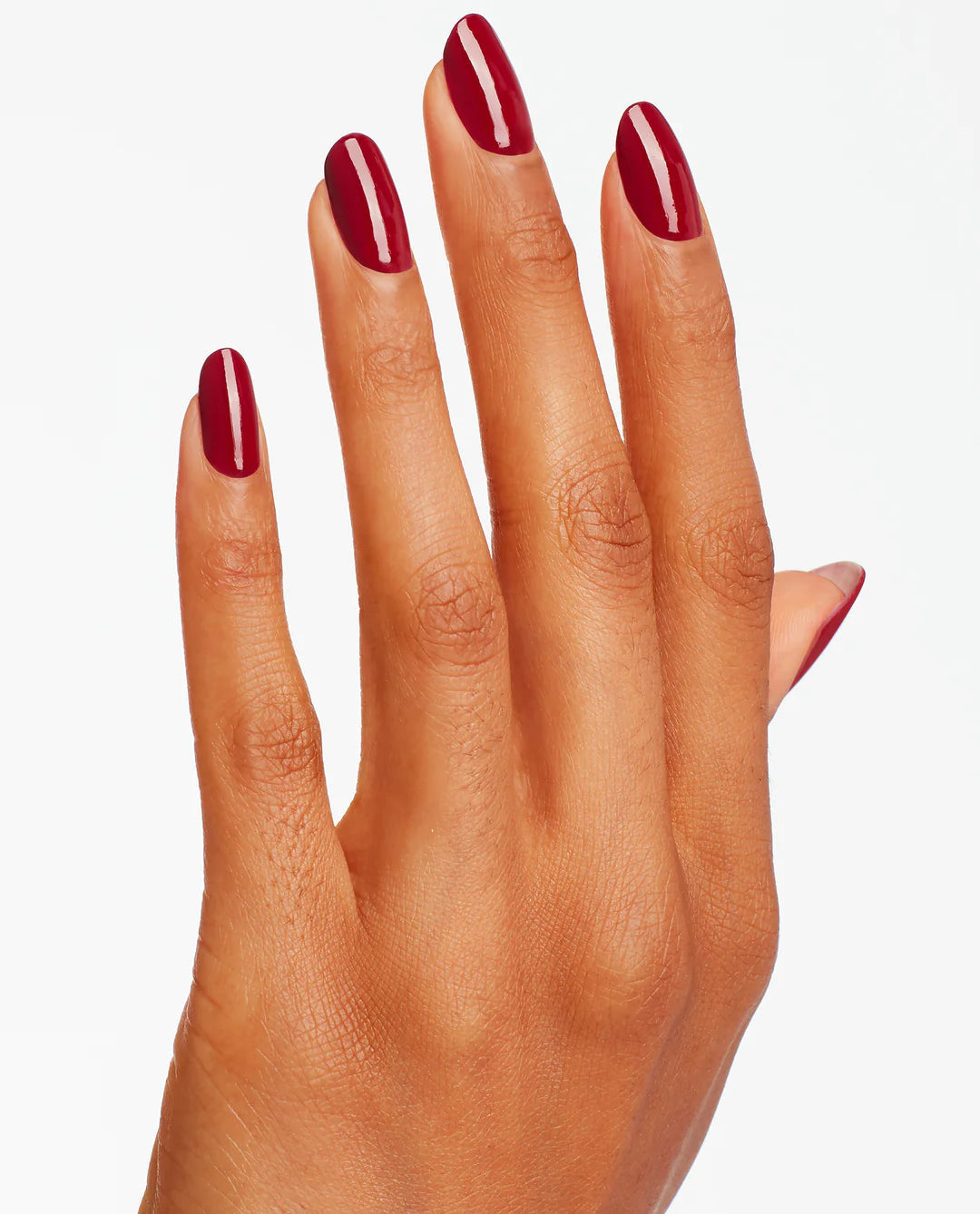 OPI Nail Polish in Malaga Wine shade, showcasing deep burgundy color with glossy finish on a nail.