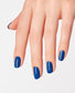 OPI Nail Polish in Mi Casa Es Blue Casa, vibrant blue nail color bottle with painted nails showcasing the shade.