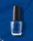 OPI Nail Polish in Mi Casa Es Blue Casa #M92, vibrant blue nail lacquer in a sleek bottle with a white cap.