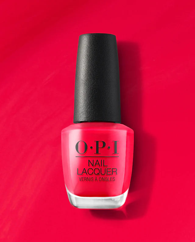 OPI Nail Polish in My Chihuahua Bites shade, a vibrant nail lacquer with a glossy finish, displayed in a sleek bottle.
