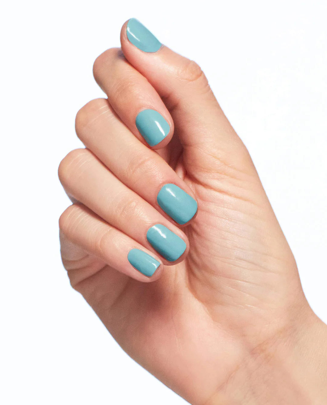 OPI Nail Polish in NFTease Me NLS006, a vibrant nail polish color, displayed in a close-up shot of the bottle.