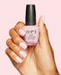 OPI Nail Polish in OPI’m a Bubble Bunny NLS061, showing the nail lacquer bottle and a hand with painted nails in a playful bubblegum pink shade