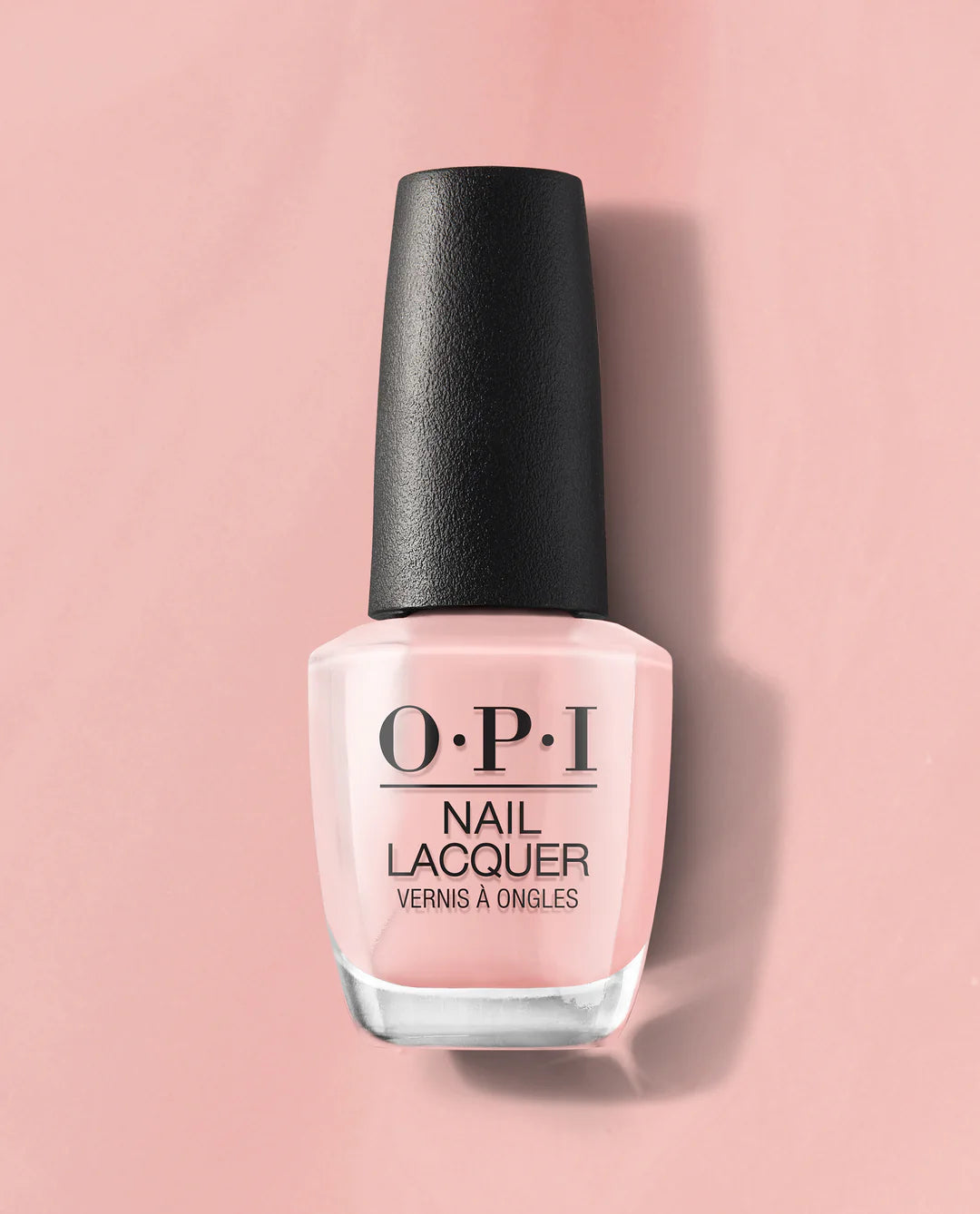 OPI Passion nail polish bottle featuring vibrant, glossy coral-orange nail lacquer with the OPI brand label visible.
