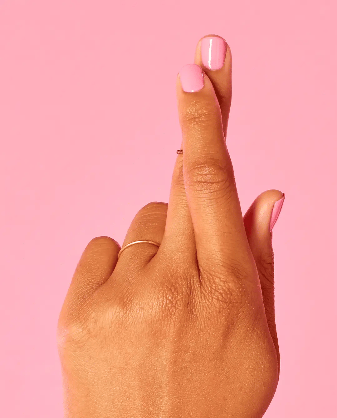 OPI Nail Polish in Pink-ing of You NLS95, vibrant pink color in a sleek bottle, showcasing glossy finish and smooth application.