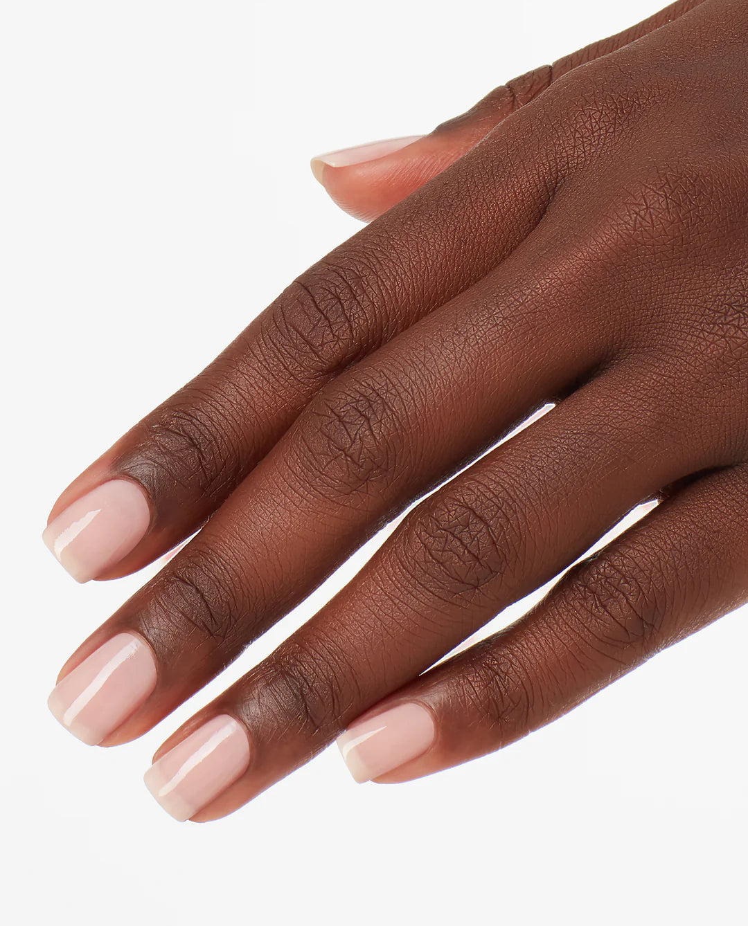 OPI Nail Polish Put It In Neutral shade showing a neutral beige nail polish bottle and swatch on a hand.