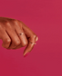 OPI Nail Polish in Red-veal Your Truth shade, showcasing a vibrant red nail polish bottle with the product label visible.