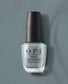 Close-up of OPI Nail Polish in Ring Bare-Er, showcasing the nude-colored nail lacquer in a sleek bottle.