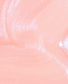 OPI Nail Polish in Rosy Future shade, showing the brush with smooth, rosy pink color swatched on a surface.