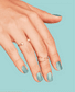 OPI Nail Polish in Sage Simulation shade, showcasing a smooth, glossy sage green color in a close-up image.