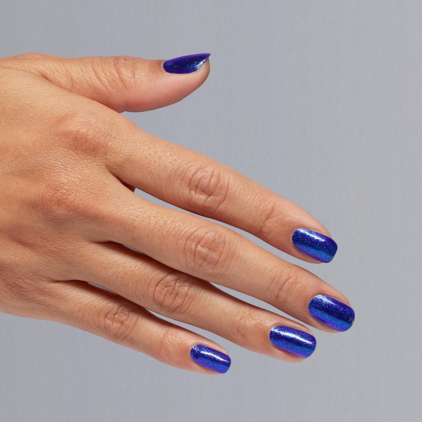 OPI Nail Polish in Scorpio Seduction shade, showcasing deep, rich red color with glossy finish and sleek bottle design.