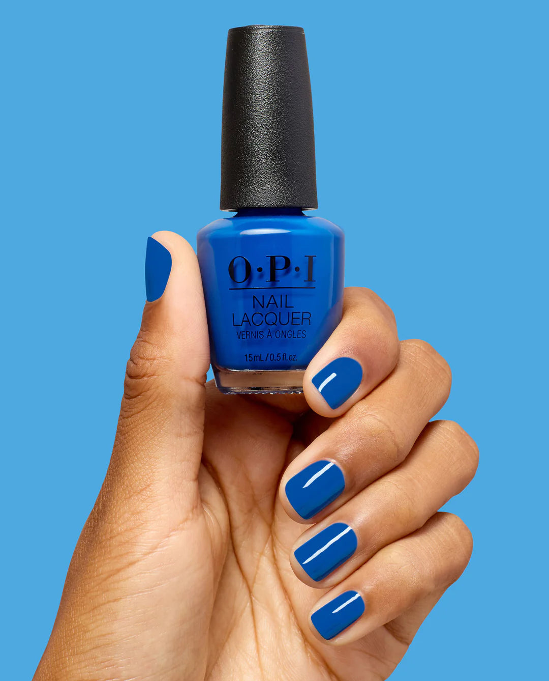 OPI Sea-ze The Day nail polish bottle and hand showing off the vibrant sea-green color, glossy finish, and sleek design.