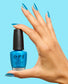 OPI Nail Polish Sky Blue Is the Limit NLS077 bottle and hand showing vibrant sky blue lacquer on nails.