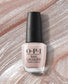 OPI Nail Polish in Throw Me a Kiss shade, showcasing the vibrant pink color in a sleek bottle with a black cap.
