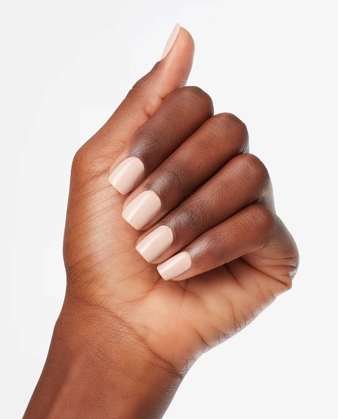OPI Nail Polish in Tiramisu For Two shade, showcasing a creamy beige nail color on neatly manicured nails.