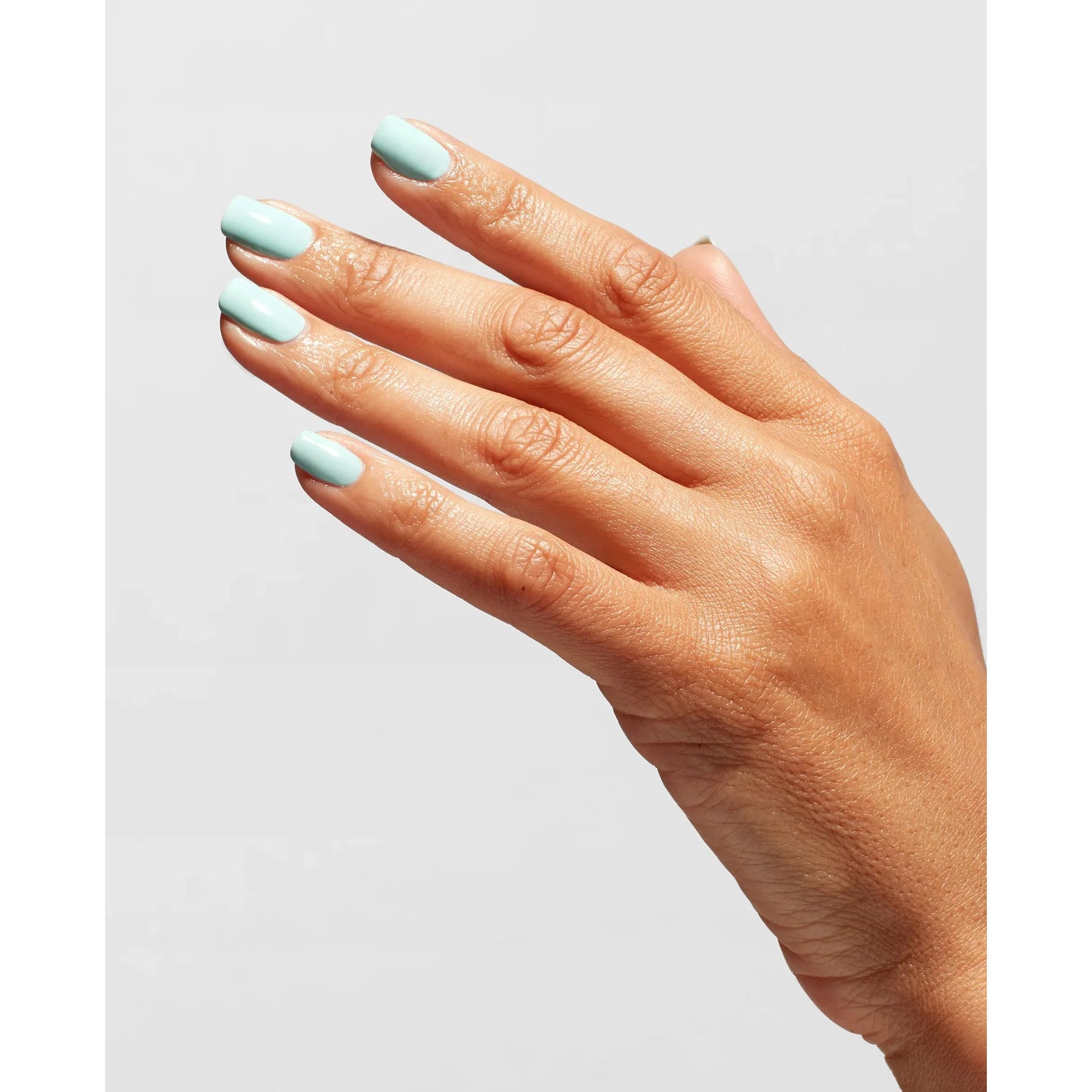 OPI Nail Polish Treatment Top Coat bottle with clear polish and brush for a glossy, protective finish on nails