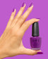 OPI Nail Polish Ultra Violet Daze NLS074 bottle and hand showcasing vibrant purple nail color in natural light