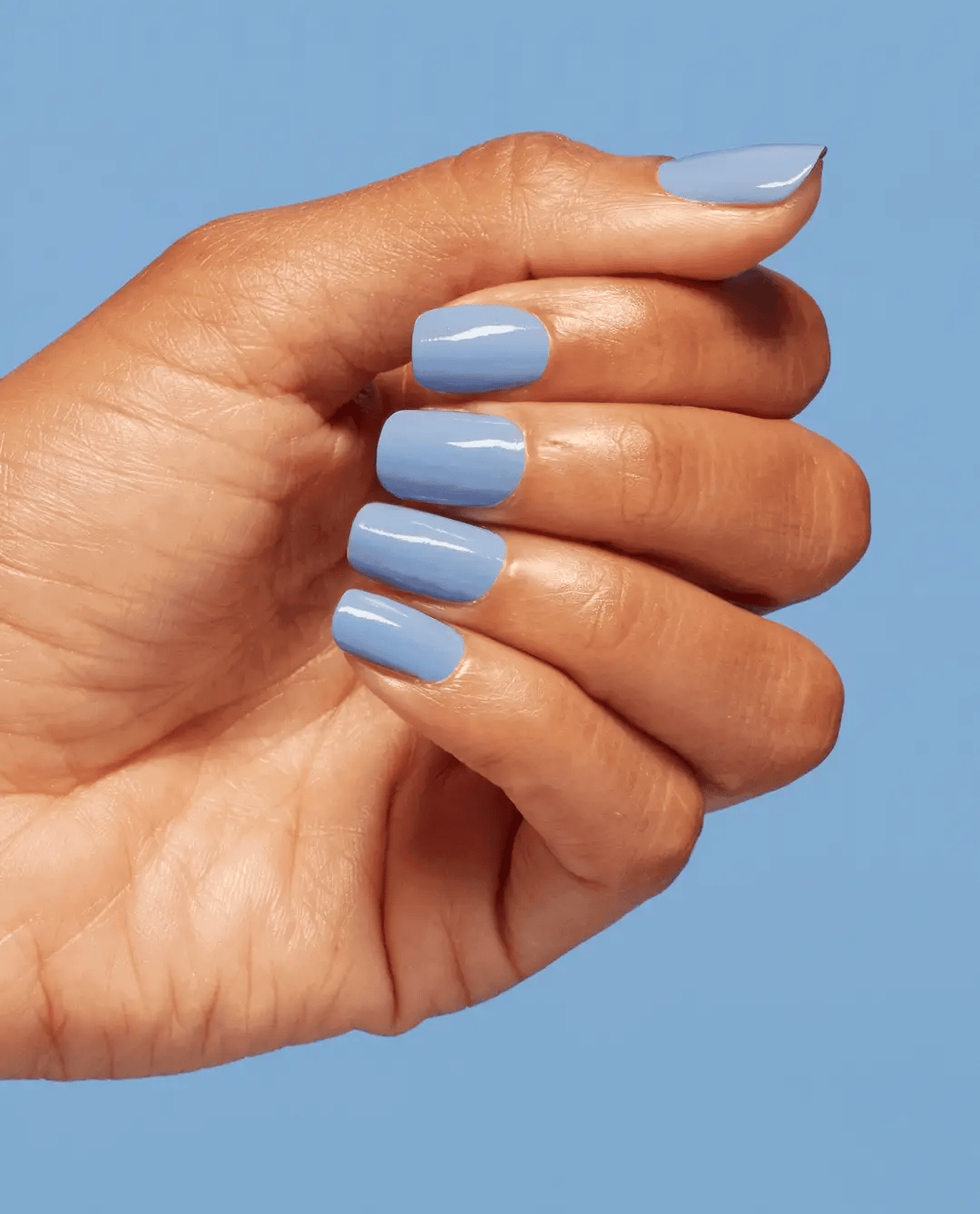 Opi Nail Polish in Verified NLS019, a vibrant nail color bottle with black cap, showcasing the Opi brand.