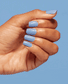 Opi Nail Polish in Verified NLS019, a vibrant nail color bottle with black cap, showcasing the Opi brand.