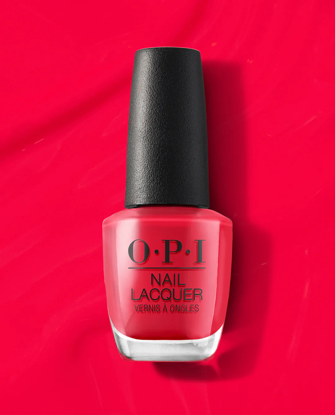 OPI Nail Polish in We Seafood And Eat It #L20, vibrant coral nail lacquer with glossy finish, displayed in a clear bottle.