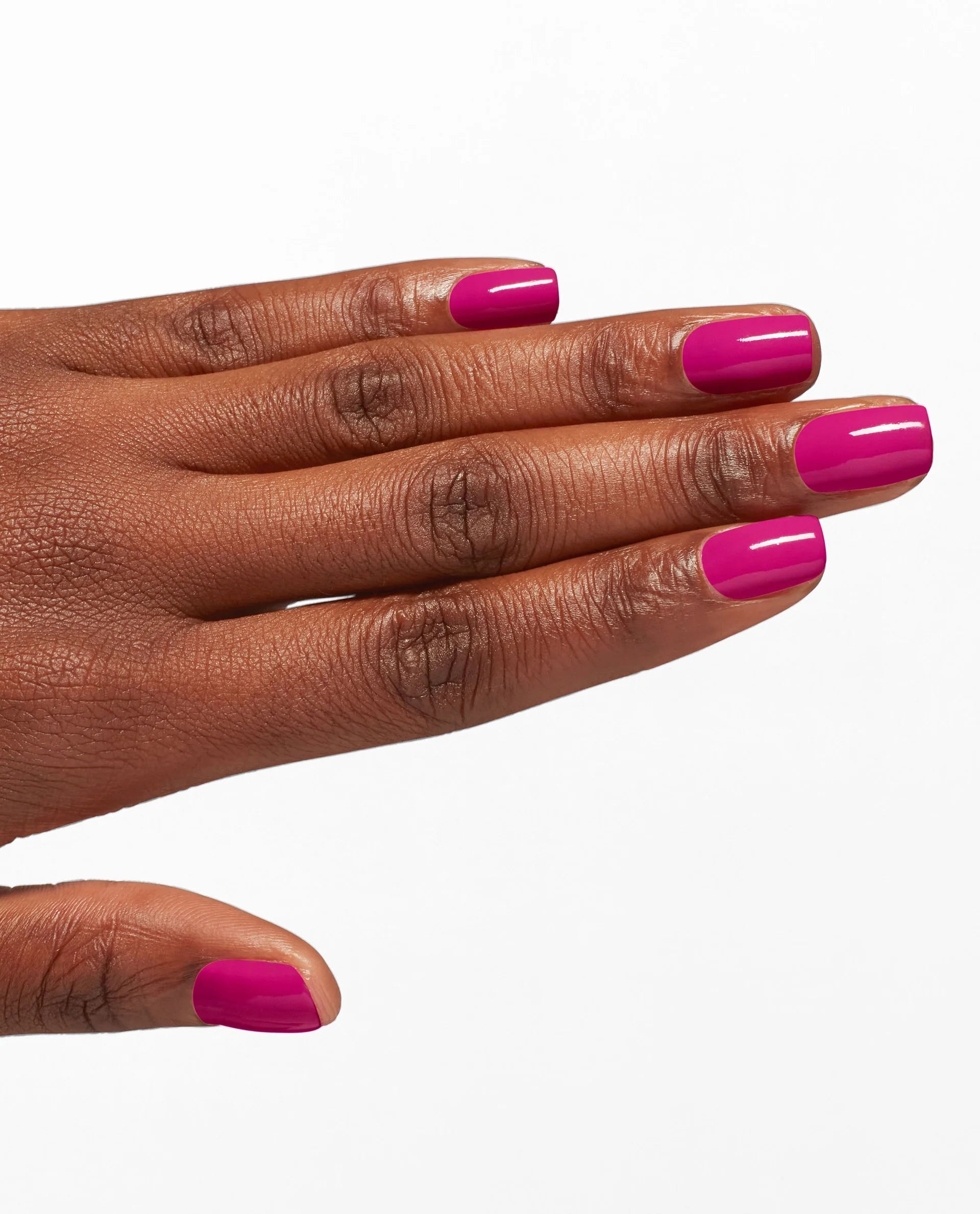 OPI Nail Polish in Without a Pout NLS016, showing the glossy pink shade applied on neatly manicured nails.