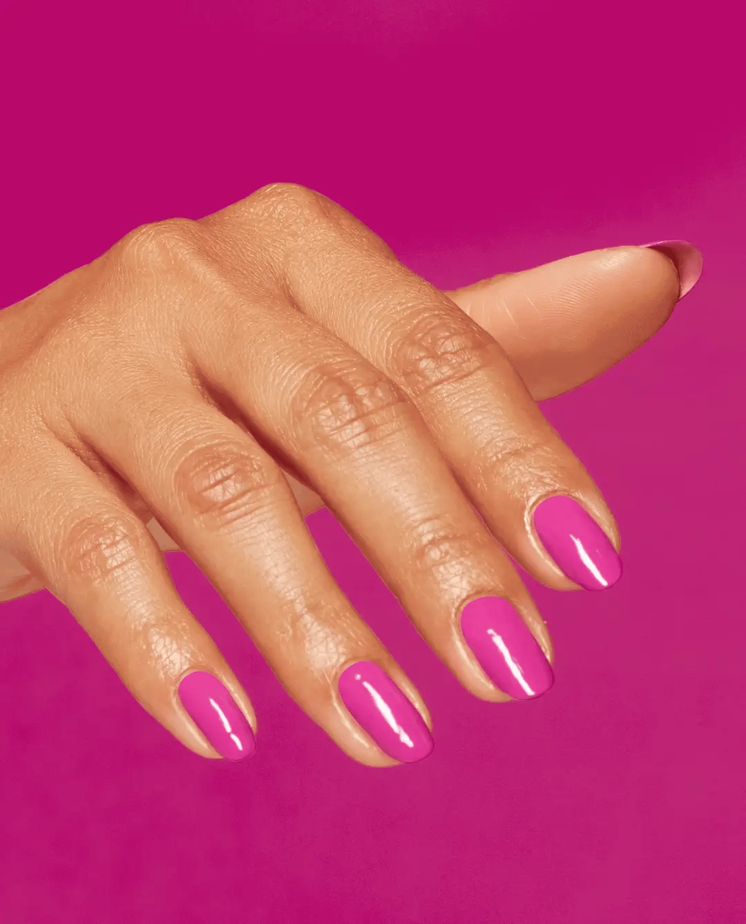 OPI Nail Polish in Without a Pout NLS016, vibrant pink shade, glossy finish, shown in a close-up bottle image.