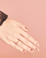 OPI Nail Polish in Worth A Pretty Penne shade, vibrant purple-colored bottle with a glossy finish, showcasing the nail polish product.